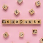 Menopause,Word,On,Wooden,Block.,Flat,Lay,View,On,Light